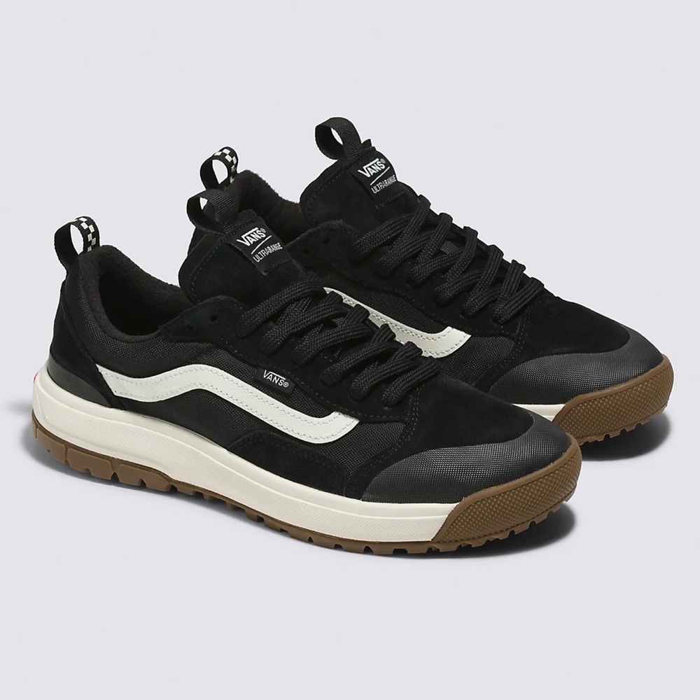 Vans Black and Cream Sneakers with Iconic Style